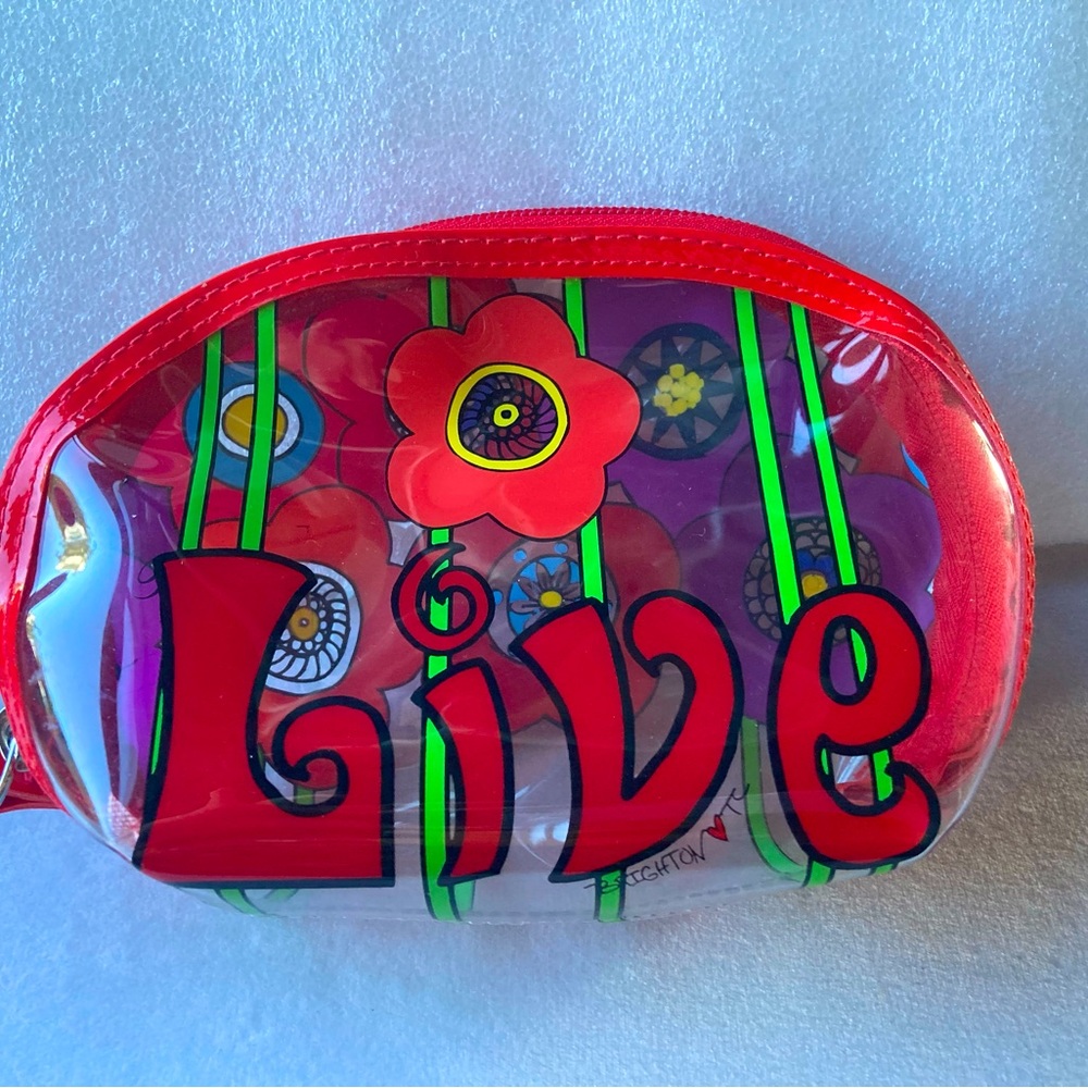 Brighton cosmetic pouch.  Clear with Live with floral design.